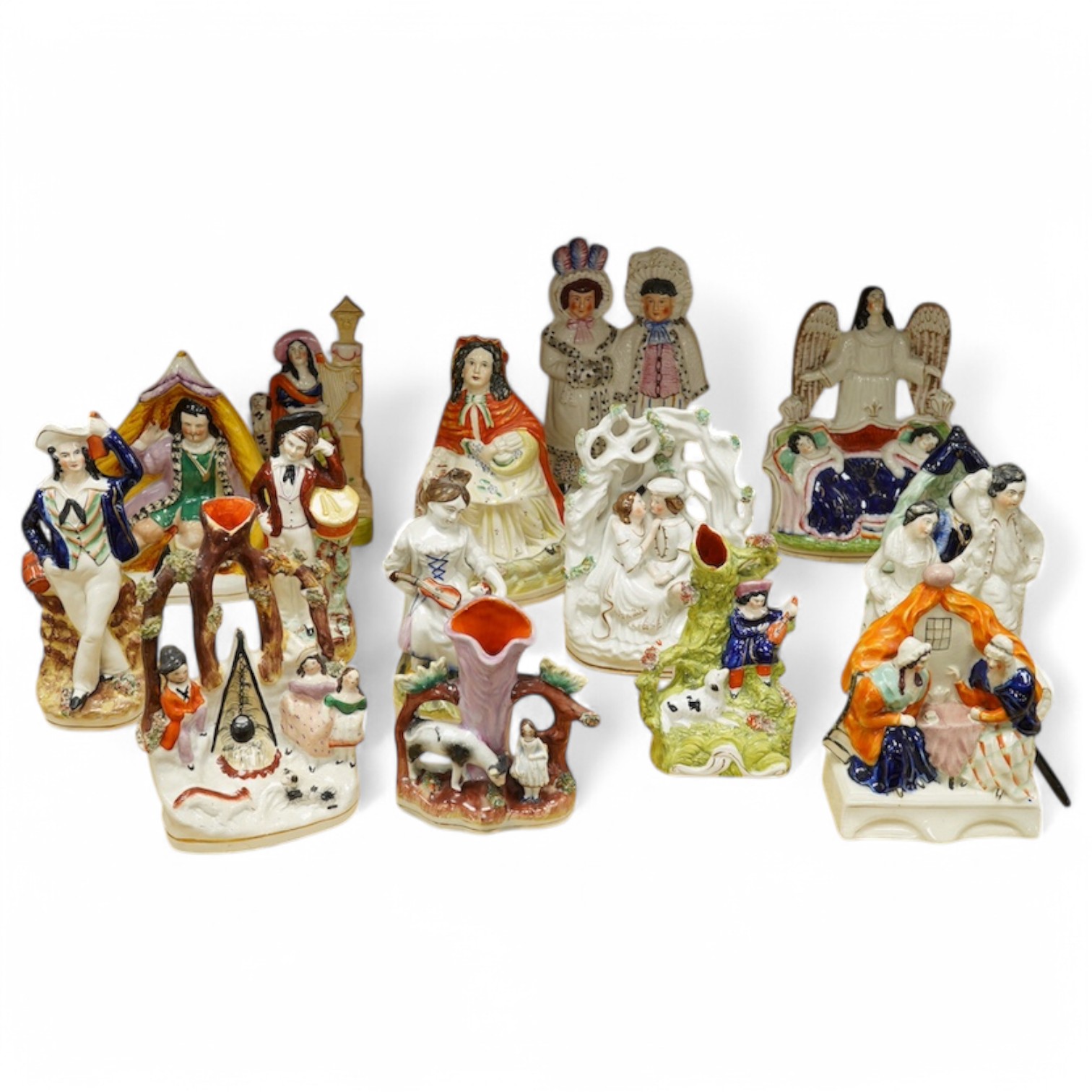 Fifteen various Staffordshire figures. Condition - fair to good